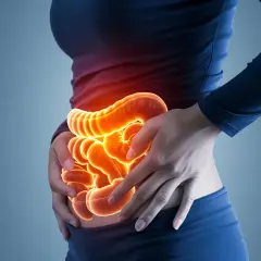 Ból brzucha, widzenie na żółto. Podświetlone jelita pulsują ciepłem, wskazując na problem.